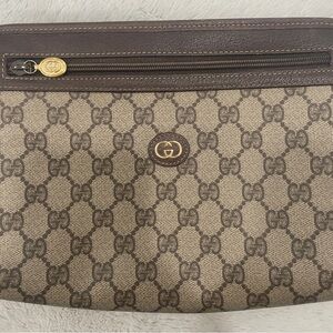 Gucci  Monogram Pouch.